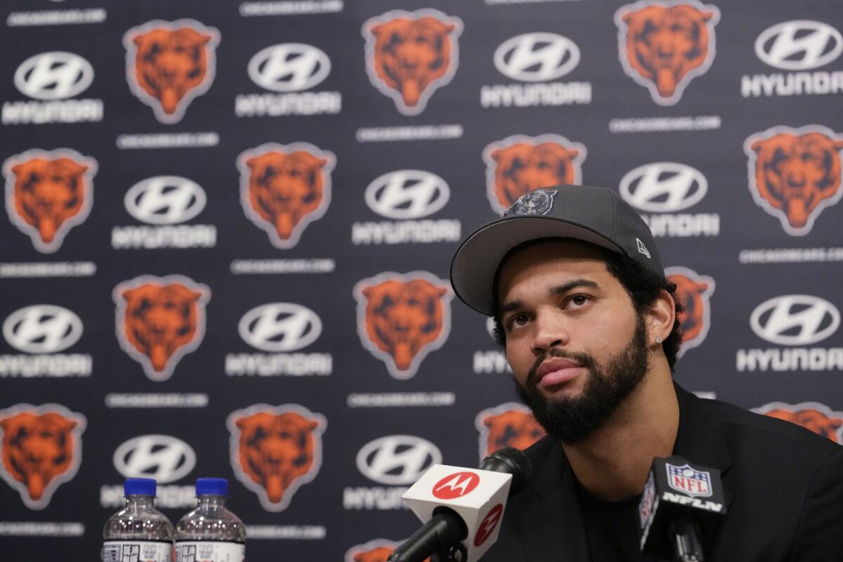 Chicago Bears No. 1 draft pick quarterback Caleb Williams listens to reporters during a news conference Friday.