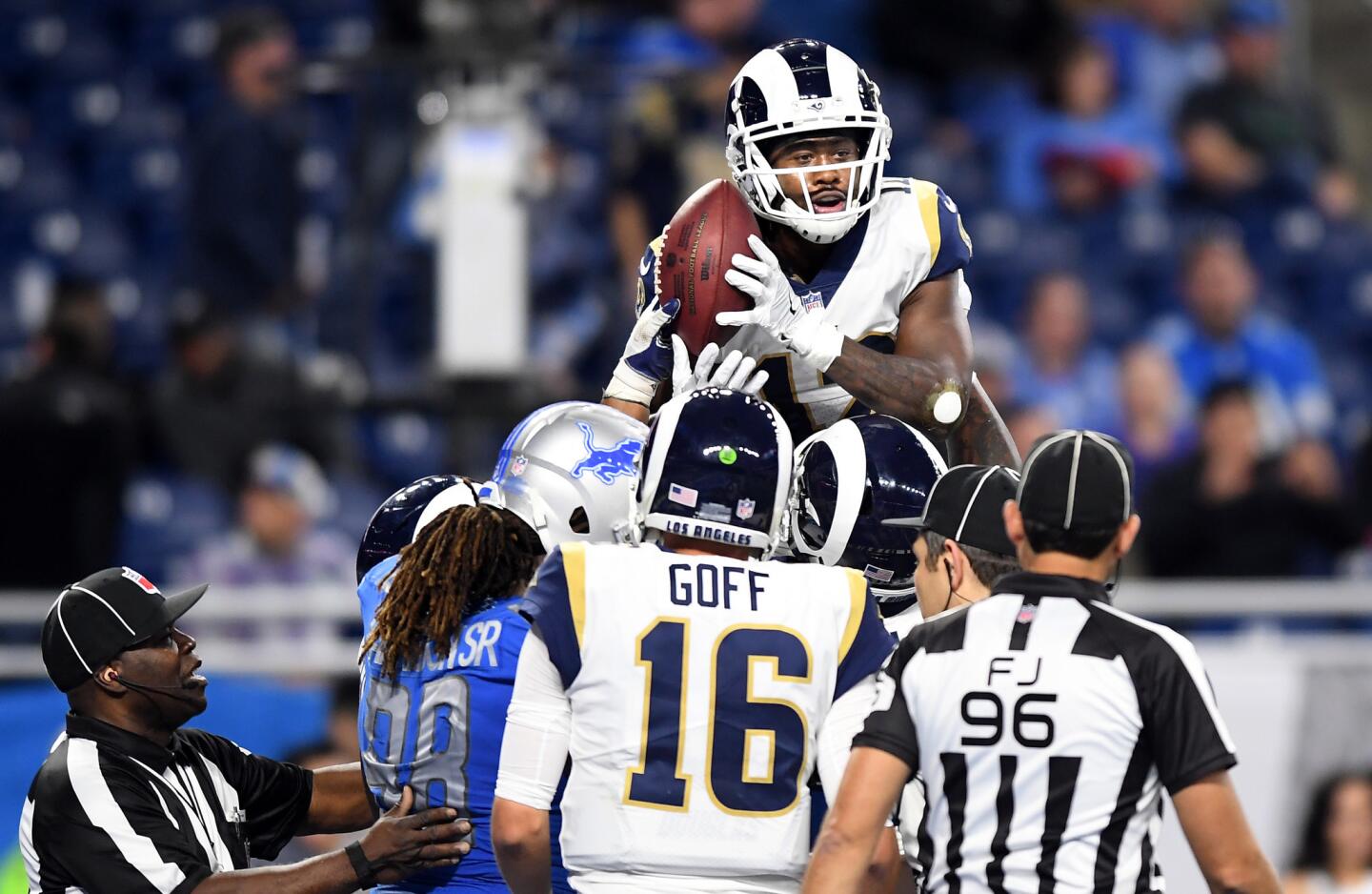 Rams receiver Brandin Cooks is given a football after Todd Gurley's touchdown against the Lions in the fourth quarter at Ford Field in Detroit on Sunday.