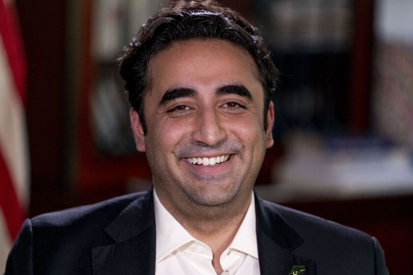 Pakistani Foreign Minister Bilawal Bhutto Zardari smiles during an interview with the Associated Press at the Pakistan Embassy, in Washington, Tuesday, Sept. 27, 2022. (AP Photo/Andrew Harnik)