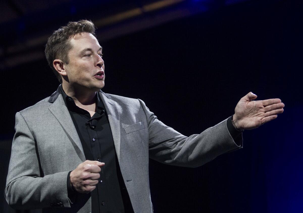 Elon Musk, chief executive of Tesla Motors Inc., at the unveiling the company’s Powerwall and Powerpack. He has used Twitter to dispute claims made in an upcoming biography.