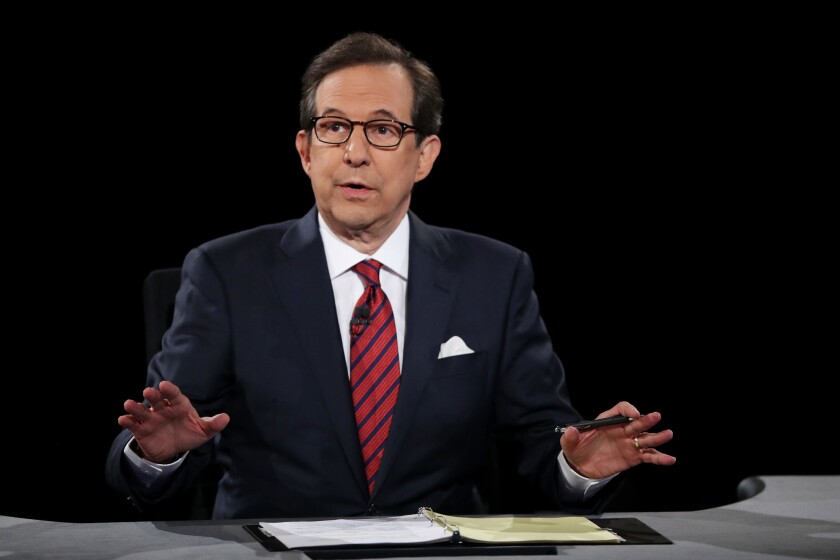 Fox News anchor Chris Wallace moderates the 2016 presidential debate in Las Vegas.