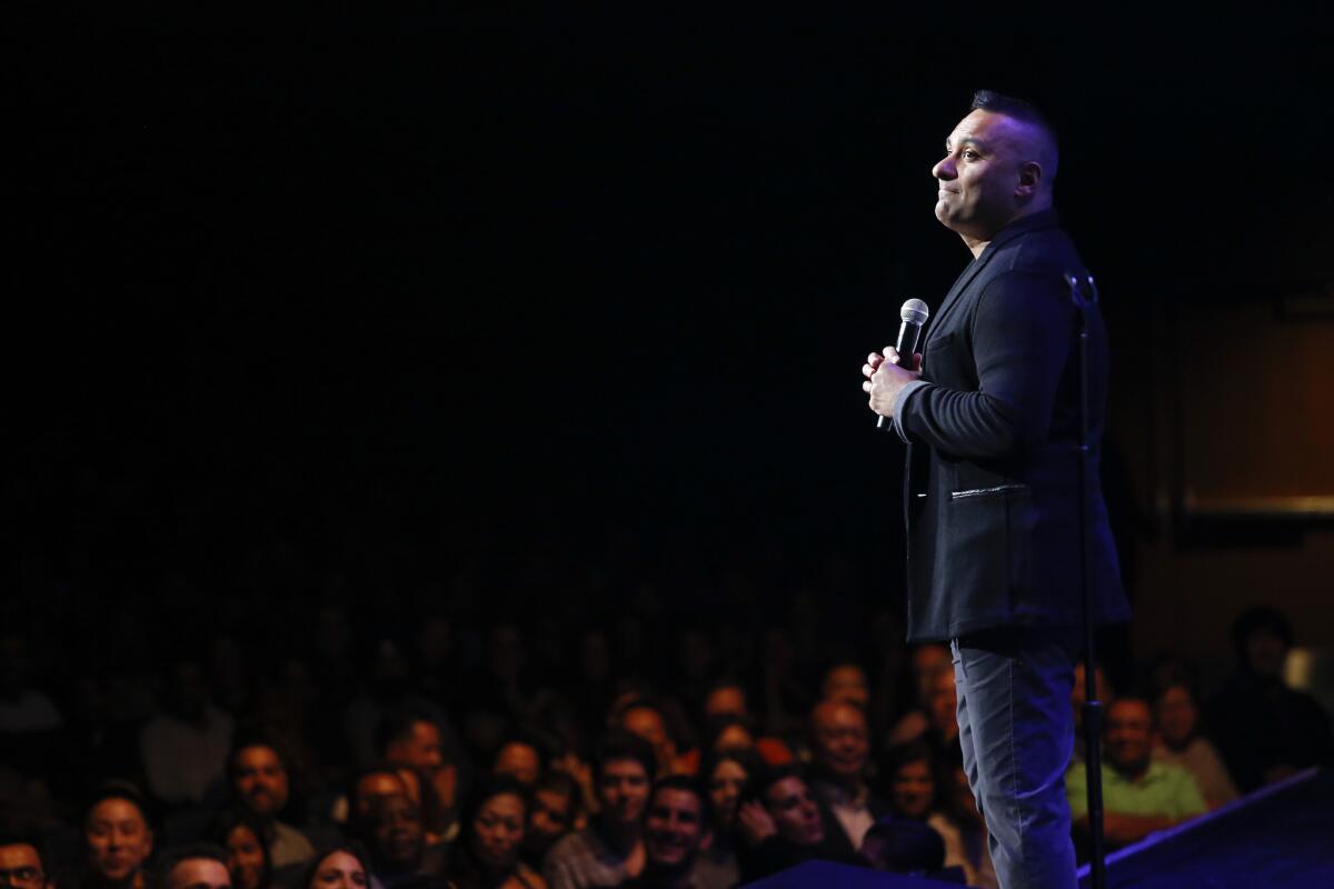 Russell Peters jokes with a crowd at the sold-out Nokia, part of his Almost Famous comedy tour.