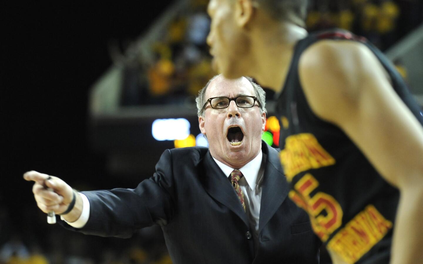 USC coach Kevin O'Neill shouts instructions to his players during a game against UCLA at the Galen Center on Jan. 9, 2011.