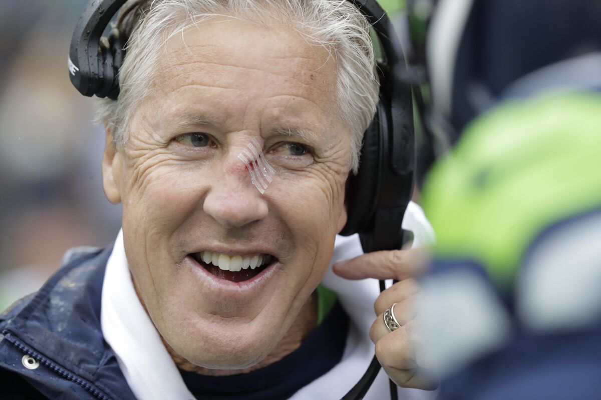 Seahawks coach Pete Carroll with stitches on his nose