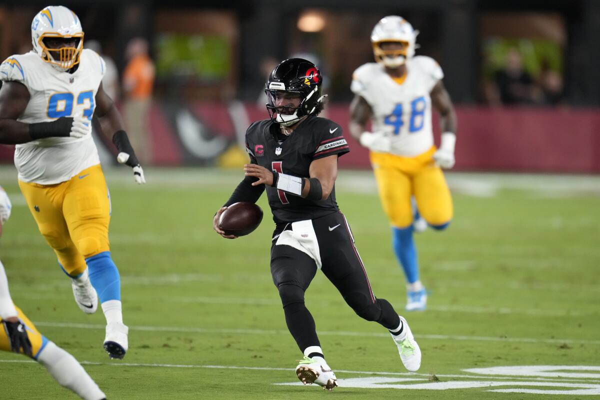 Arizona Cardinals quarterback Kyler Murray scrambles against the Chargers in the first half.