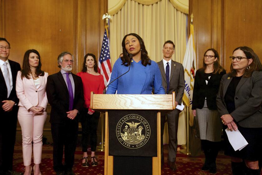San Francisco Mayor London Breed announces the first confirmed cases of novel coronavirus in the city alongside public health and city officials during a news conference at City Hall in San Francisco, Thursday, March 5, 2020. (Kevin N. Hume/The San Francisco Examiner via AP)