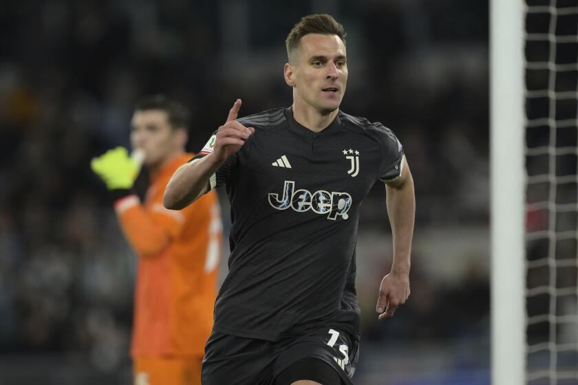 Juventus' Arkadiusz Milik celebrates after scoring his side's first goal during the Italian Cup semi-final soccer match between Lazio and Juventus at Rome's Olympic Stadium, Italy, Tuesday, April 23, 2024. (Alfredo Falcone/LaPresse via AP)