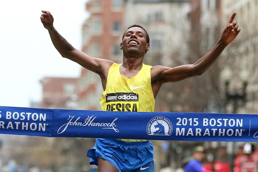 Lelisa Desisa of Ethiopa crosses the finish line to win the 119th Boston Marathon on April 20.