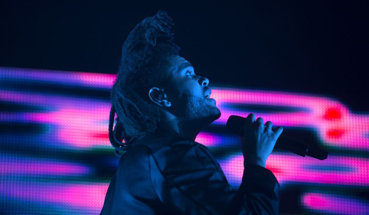 The Weeknd, seen performing in April at Coachella, has a new album, "Beauty Behind the Madness."