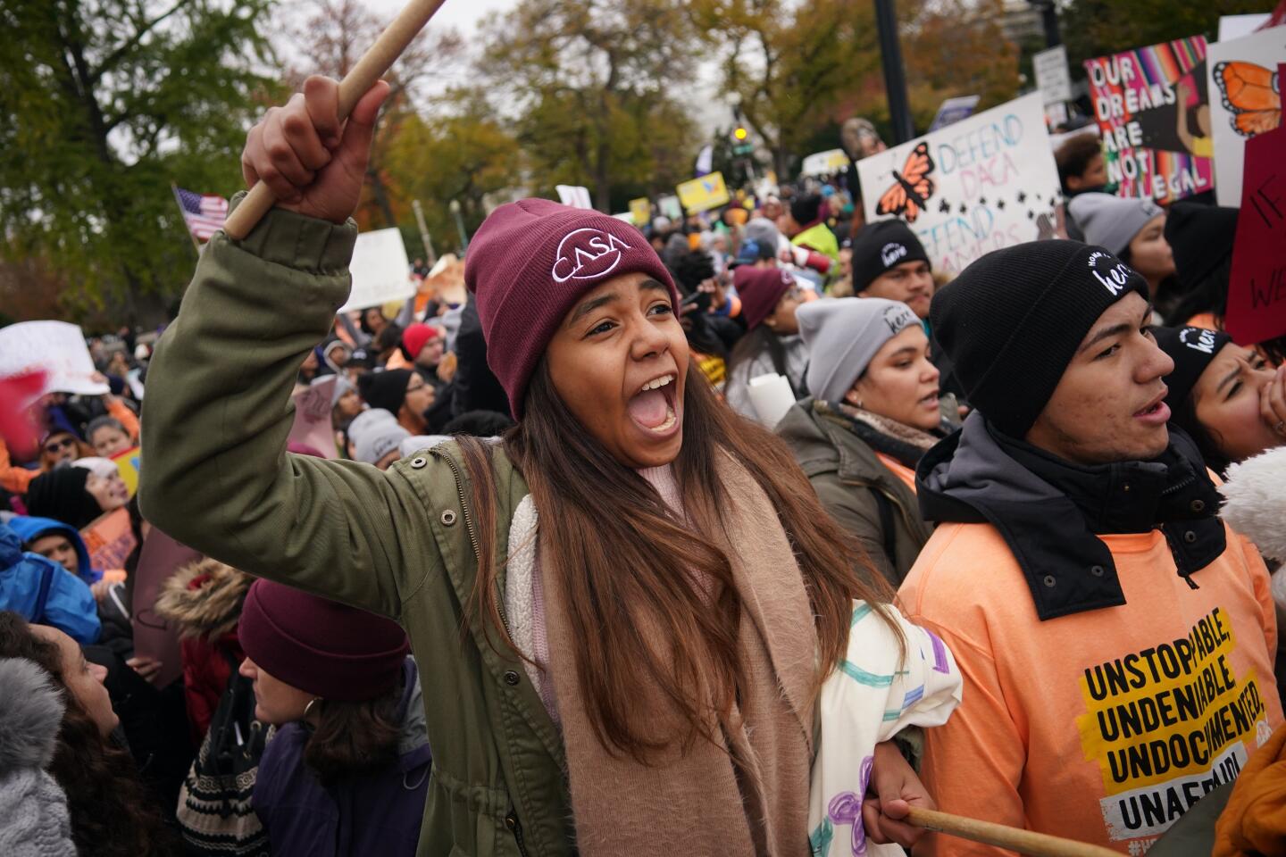 Immigration rights activists rally in front of the U.S. Supreme Court