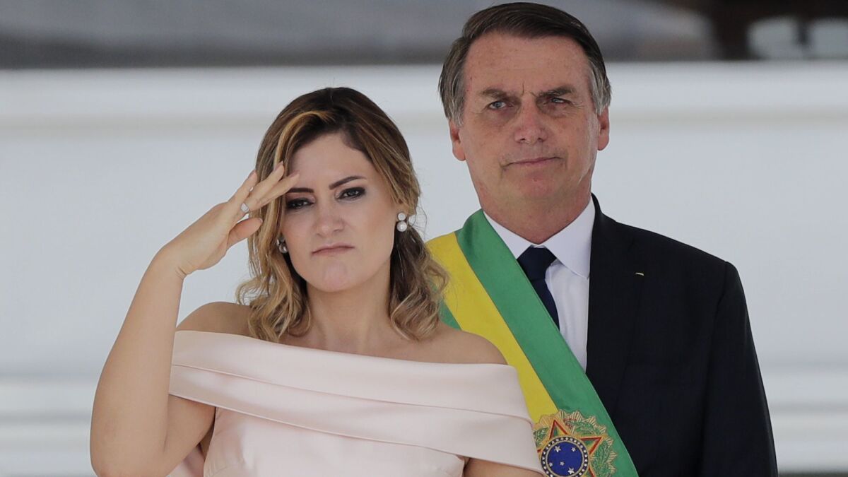 New Brazilian President Jair Bolsonaro and wife Michelle at the presidential palace in Brasilia.
