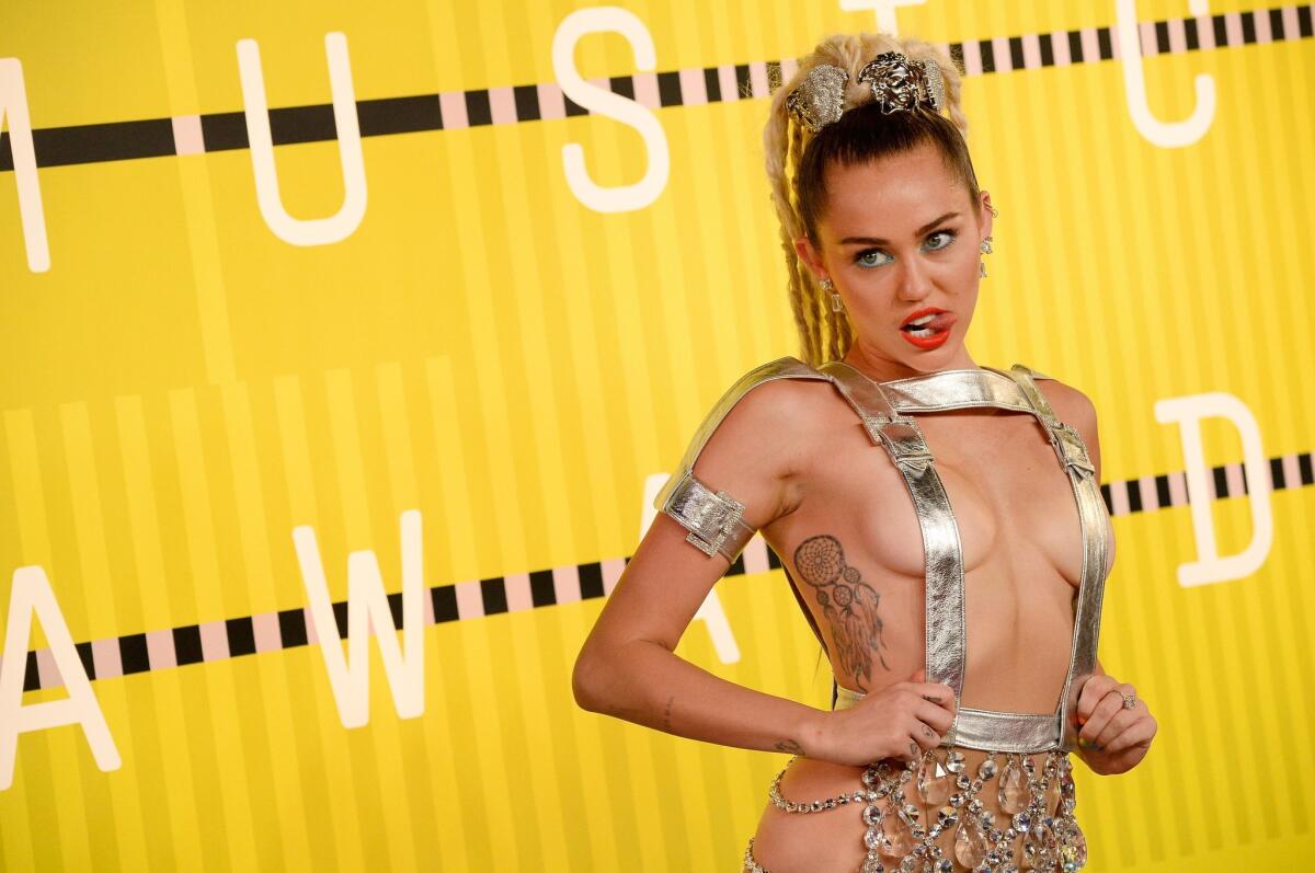 Host Miley Cyrus attends the 2015 MTV Video Music Awards at Microsoft Theater in Los Angeles, California.