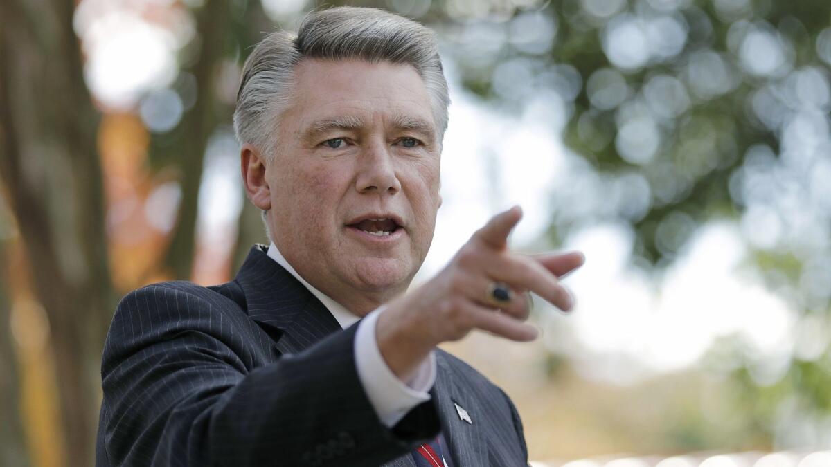 Mark Harris speaks to the media during a news conference in Matthews, N.C., on Nov. 7.