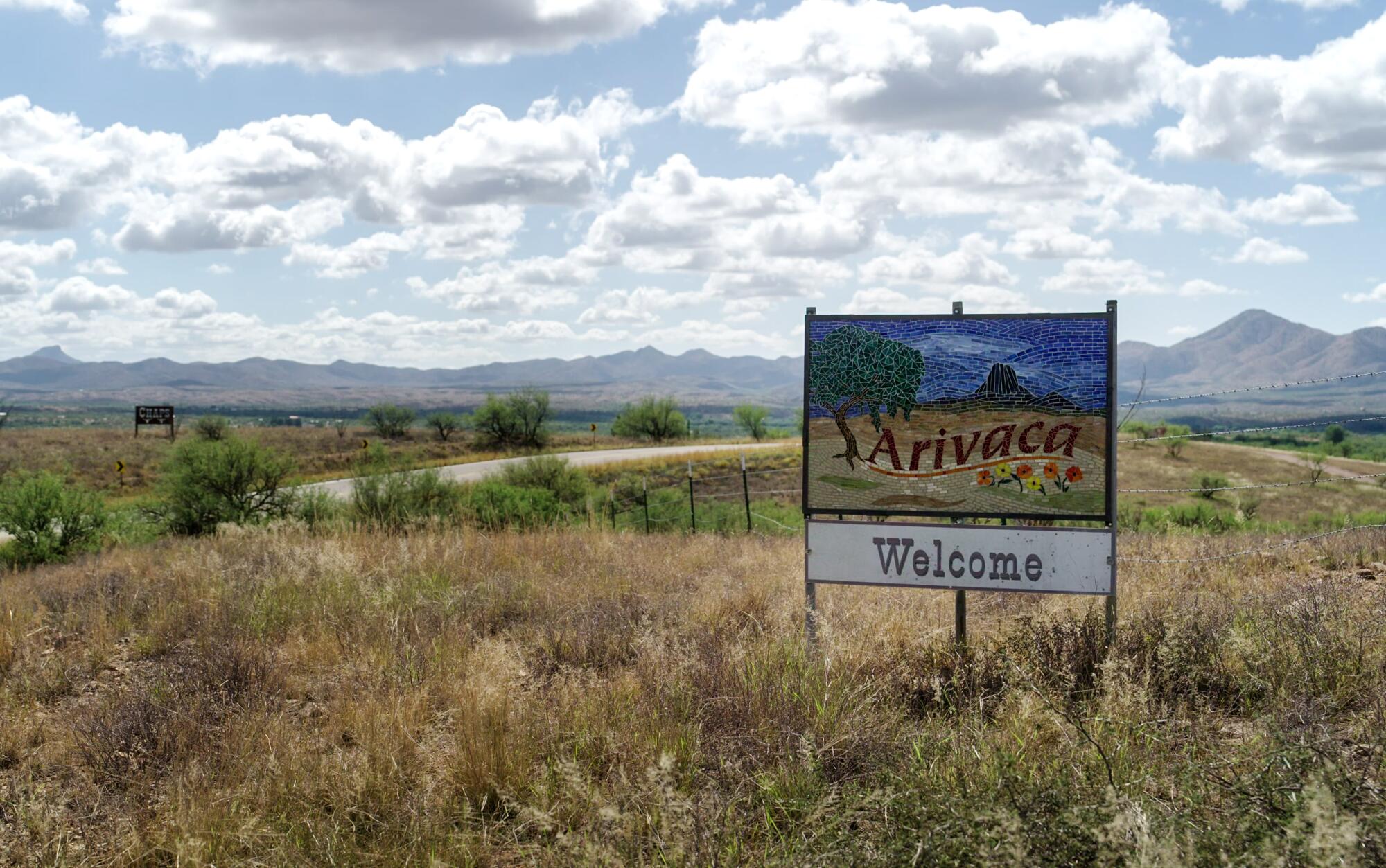 A sign welcomes visitors to Arivaca, Ariz., a town near the U.S.-Mexico border