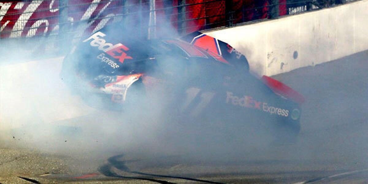 Denny Hamlin suffered a broken back during a crash at Fontana during the Auto Club 400 on Sunday.