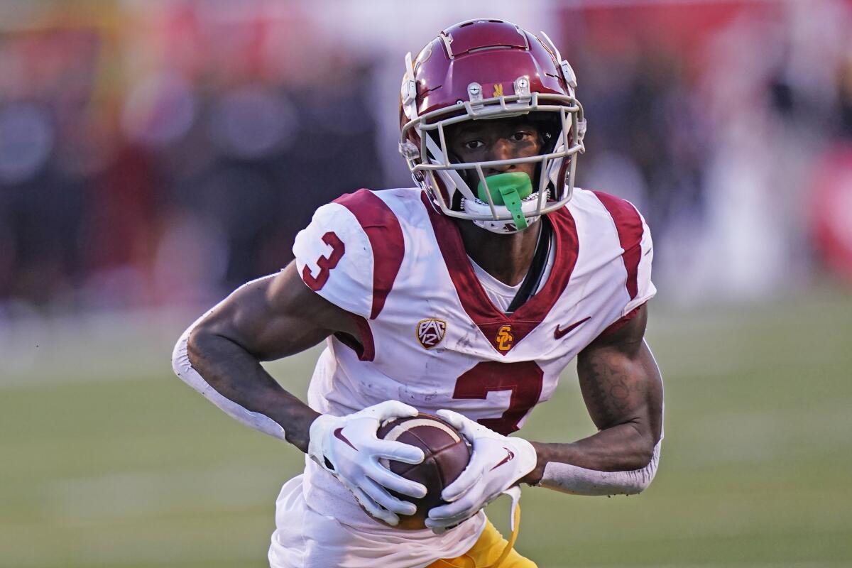 USC wide receiver Jordan Addison carries the ball against Utah last month.