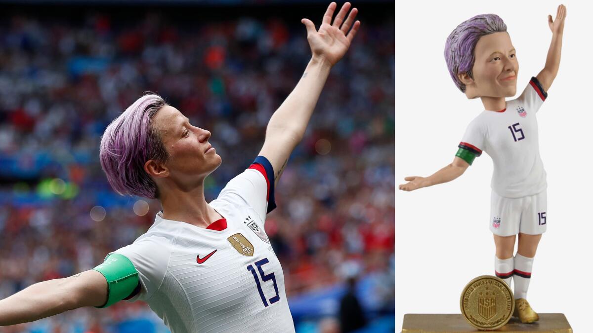 U.S. forward Megan Rapinoe celebrates with teammate Alex Morgan after scoring against Netherlands on a penalty kick during the Women's World Cup Final last month.