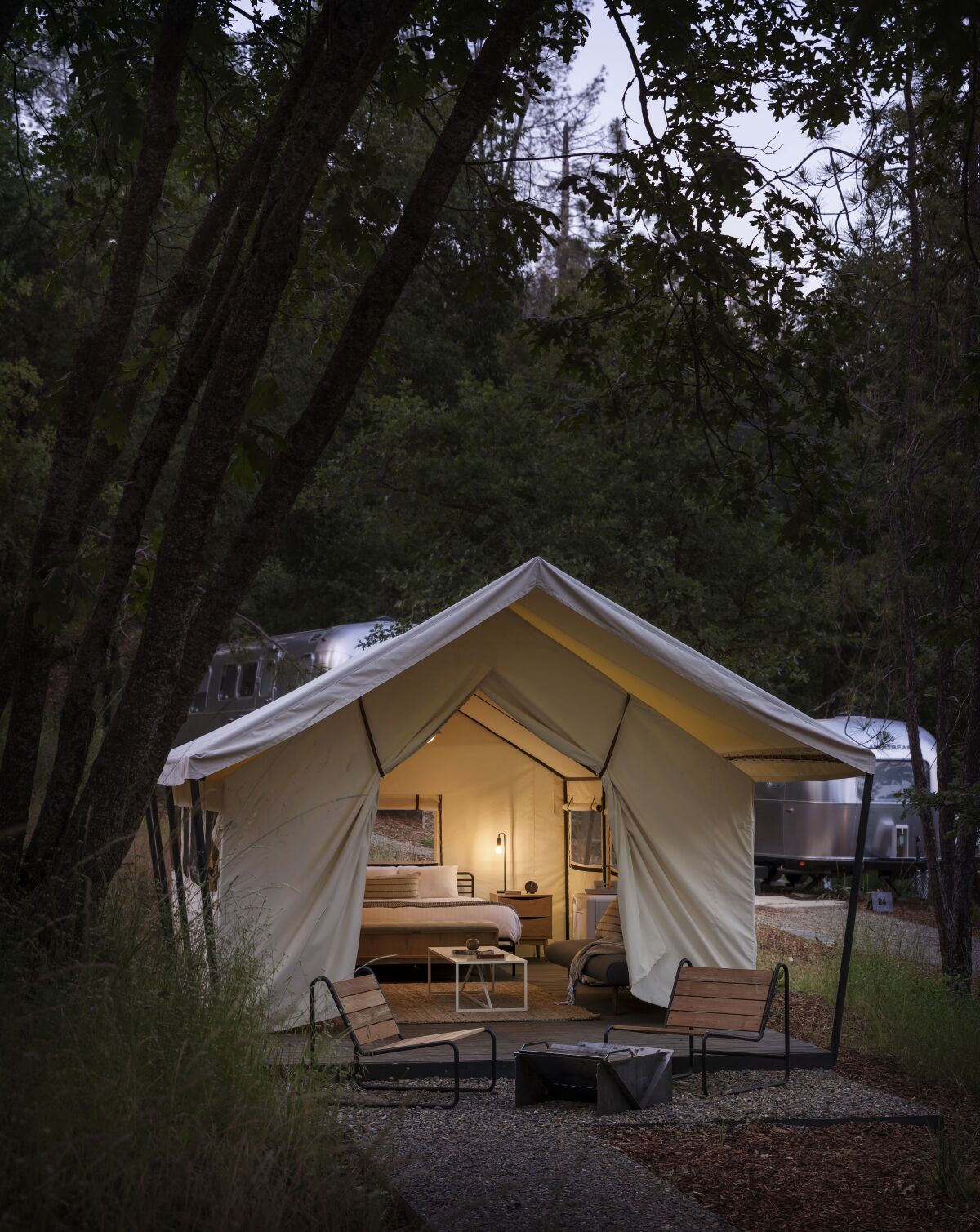 A glamping tent at night at AutoCamp at Yosemite