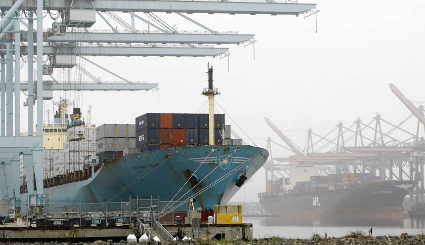 A container vessel is off-loaded in the Port of Los Angeles. "The largest port in the U.S. has not conducted a cyber security vulnerability assessment, nor does it have a cyber incident response plan," a Coast Guard commander wrote of the port.