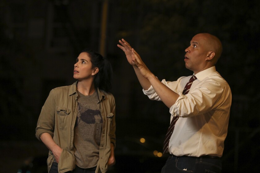 Sarah Silverman with guest Sen. Cory Booker on an episode of her late Hulu series "I Love You, America."