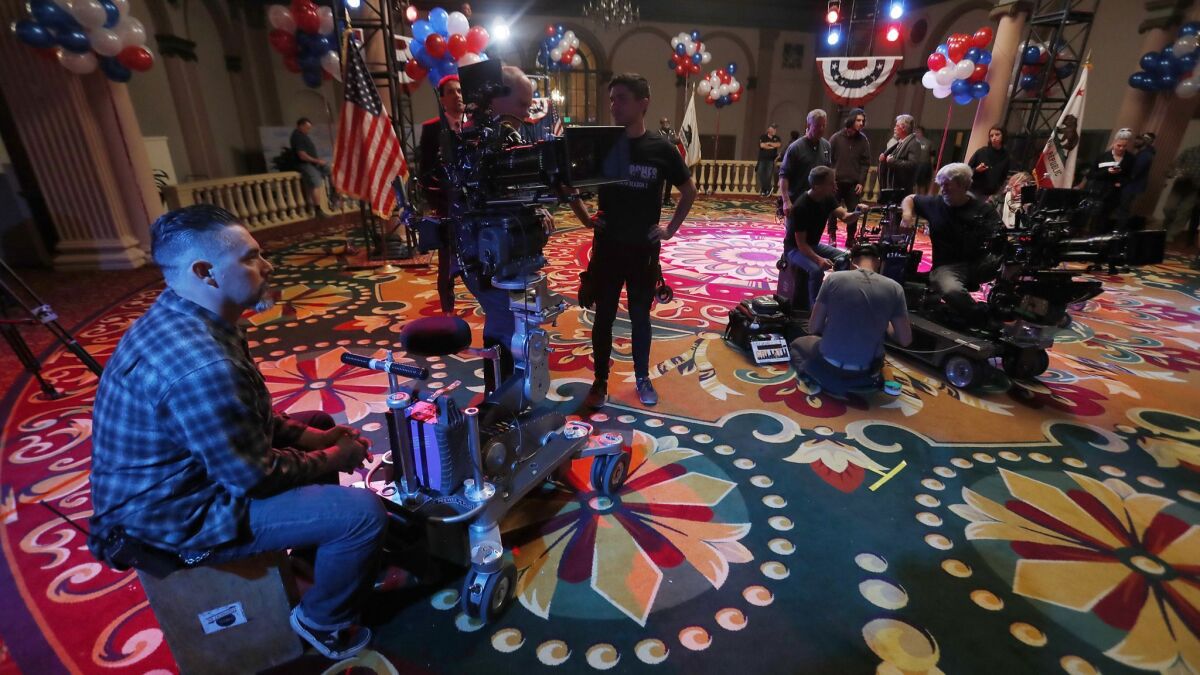 A production crew prepares a set for the season finale of the Amazon Studios original series "Goliath" at the Biltmore Hotel in downtown Los Angeles on Dec. 21, 2017.
