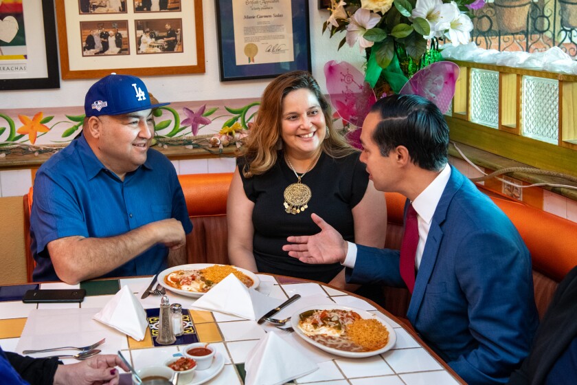 For 2020 candidates, eating tacos is the kissing babies of stumping for