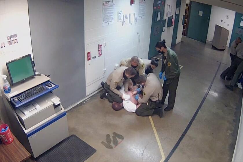 Los Angeles County sheriff’s officials attempted to hide an incident in which a deputy kneeled on the head of an inmate for three minutes while the man was handcuffed.