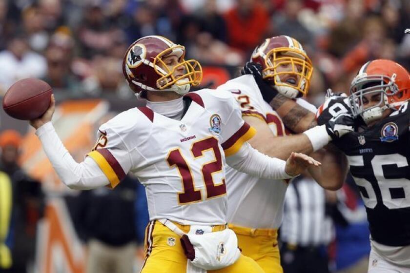 Washington quarterback Kirk Cousins threw for 329 yards, two touchdowns and an interception against the Cleveland Browns on Sunday.