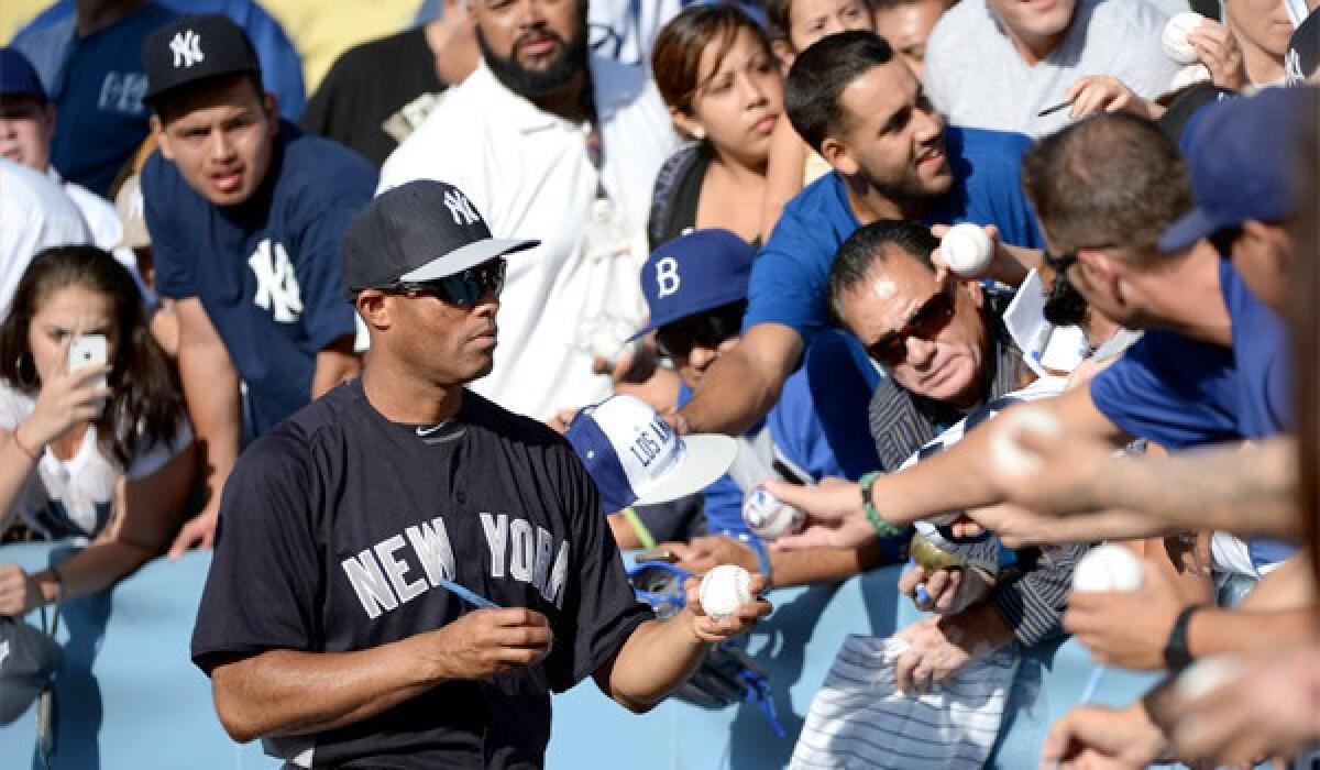 Mariano Rivera met with approximately 20 longtime Dodgers employees before the New York Yankees took on the Dodgers at Dodger Stadium on Wednesday.