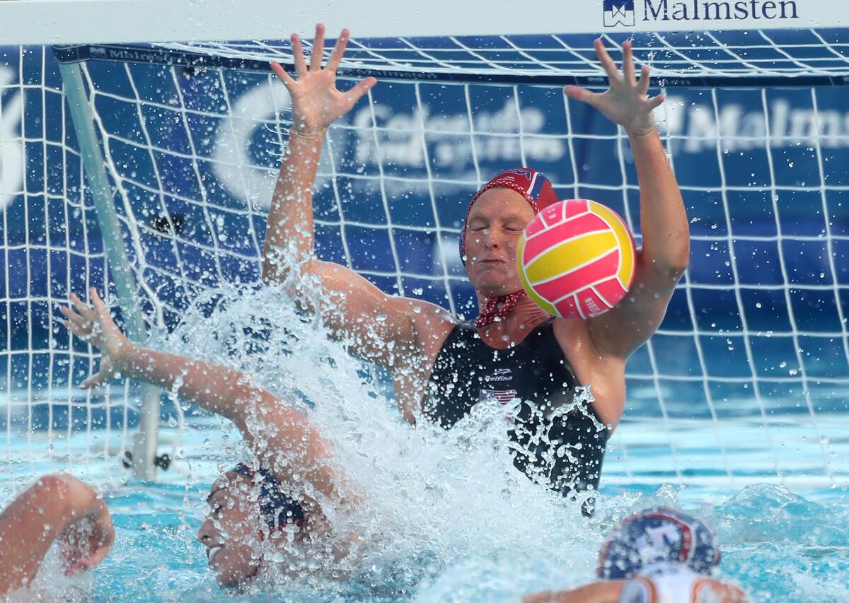 Team USA goalie Amanda Longan makes a save up close against Spain during Friday's exhibition match.