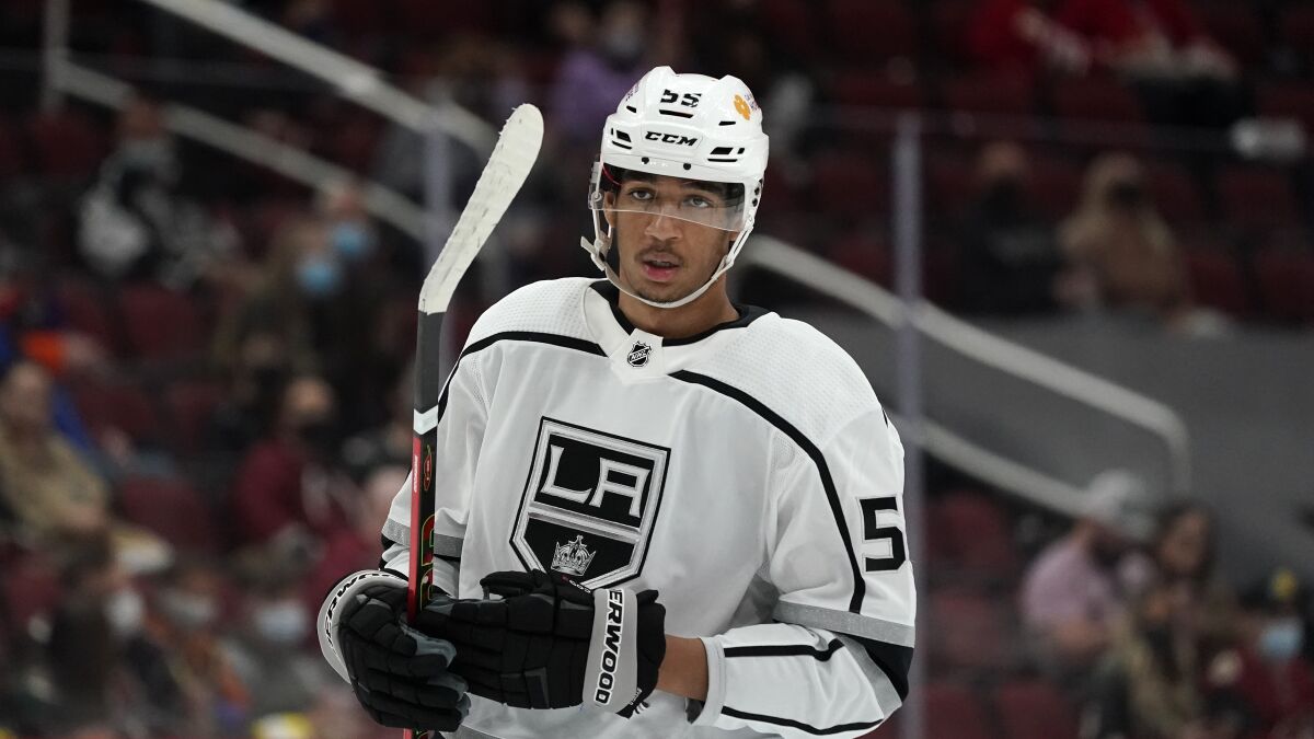 Kings center Quinton Byfield adjusts his glove during the first period of game in May.