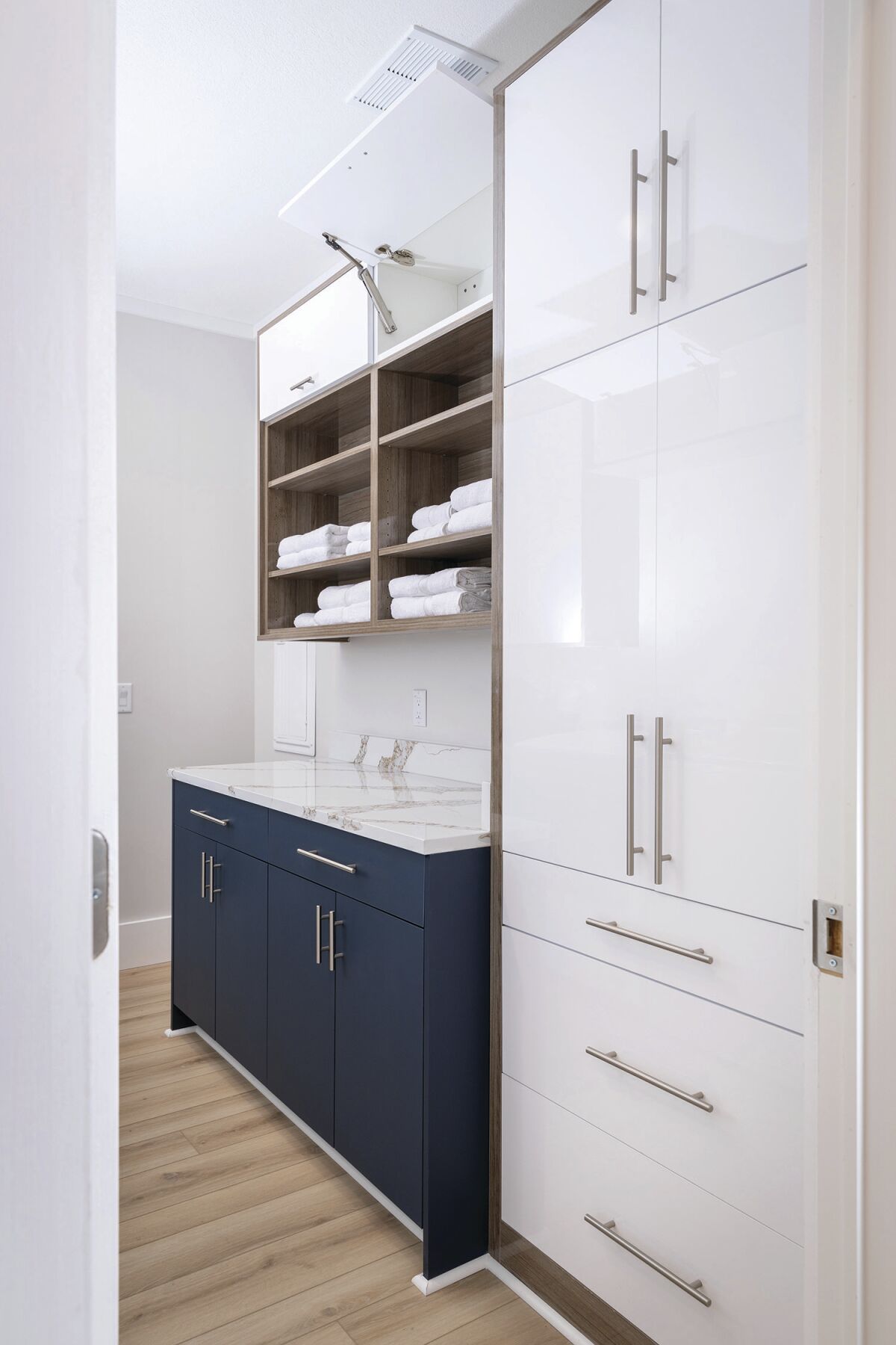 Hideaway storage spaces can add to the space without interrupting the design aesthetic.