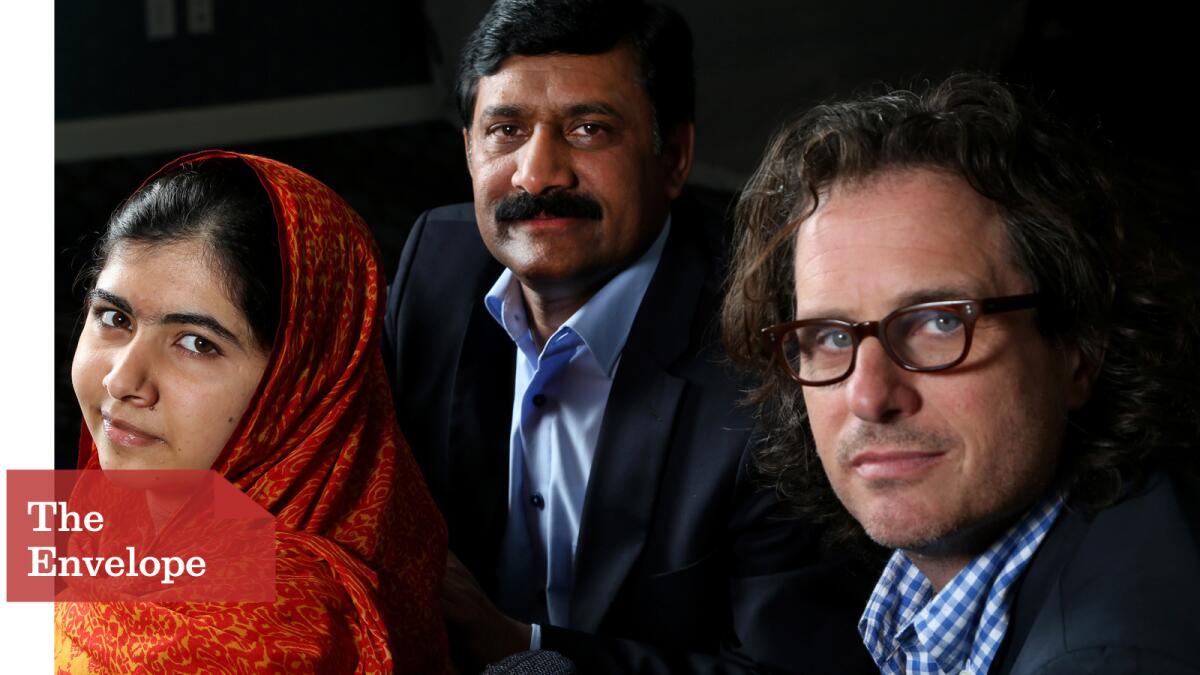 The relationship between Nobel Peace Prize laureate Malala Yousafzai, from left, and her father, Ziauddin Yousafzai, is the focus of documentarian Davis Guggenheim's "He Named Me Malala."