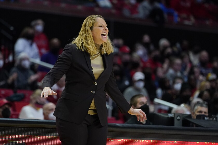 Maryland head coach Brenda Frese reacts after a play against Northwestern during the second half of an NCAA college basketball game, Sunday, Jan. 23, 2022, in College Park, Md. Maryland won 87-59. (AP Photo/Julio Cortez)