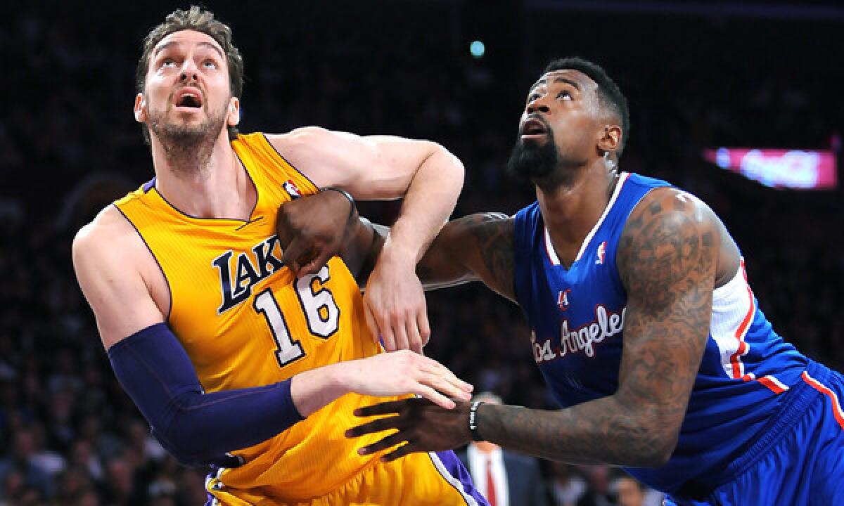Lakers center Pau Gasol, left, battles Clippers center DeAndre Jordan for position under the basket during the Clippers' 142-94 win on March 6.