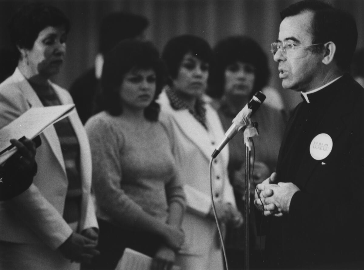 Father Pedro Villaroyo leads a prayer.