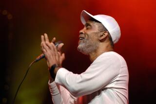 Frankie Beverly performs in white cap and shirt during 100 Black Men "Le Cabaret" sponsored by Ford