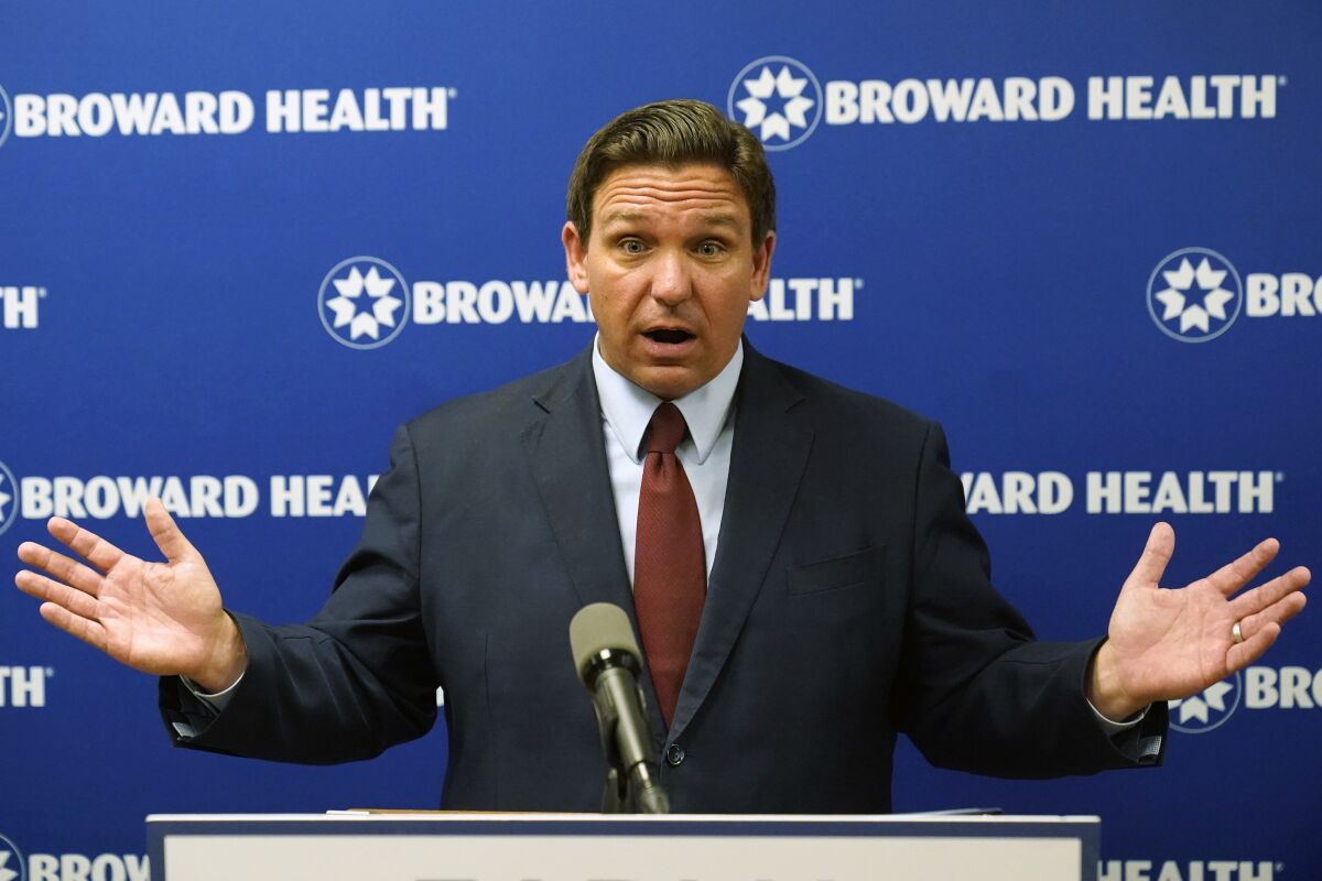FILE - Florida Gov. Ron DeSantis speaks at a news conference, Thursday, Sept. 16, 2021, at the Broward Health Medical Center in Fort Lauderdale, Fla. President Joe Biden’s plan to require vaccinations at all private employers of 100 workers or more has already hit a wall of opposition from Republican governors, state lawmakers and attorneys general.(AP Photo/Wilfredo Lee, File)