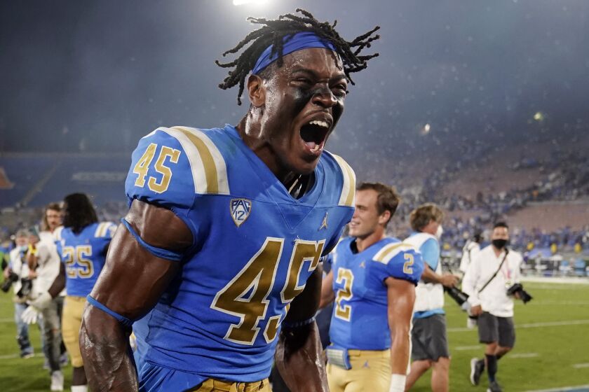UCLA linebacker Mitchell Agude (45) celebrates the team's win over LSU in an NCAA college football game.