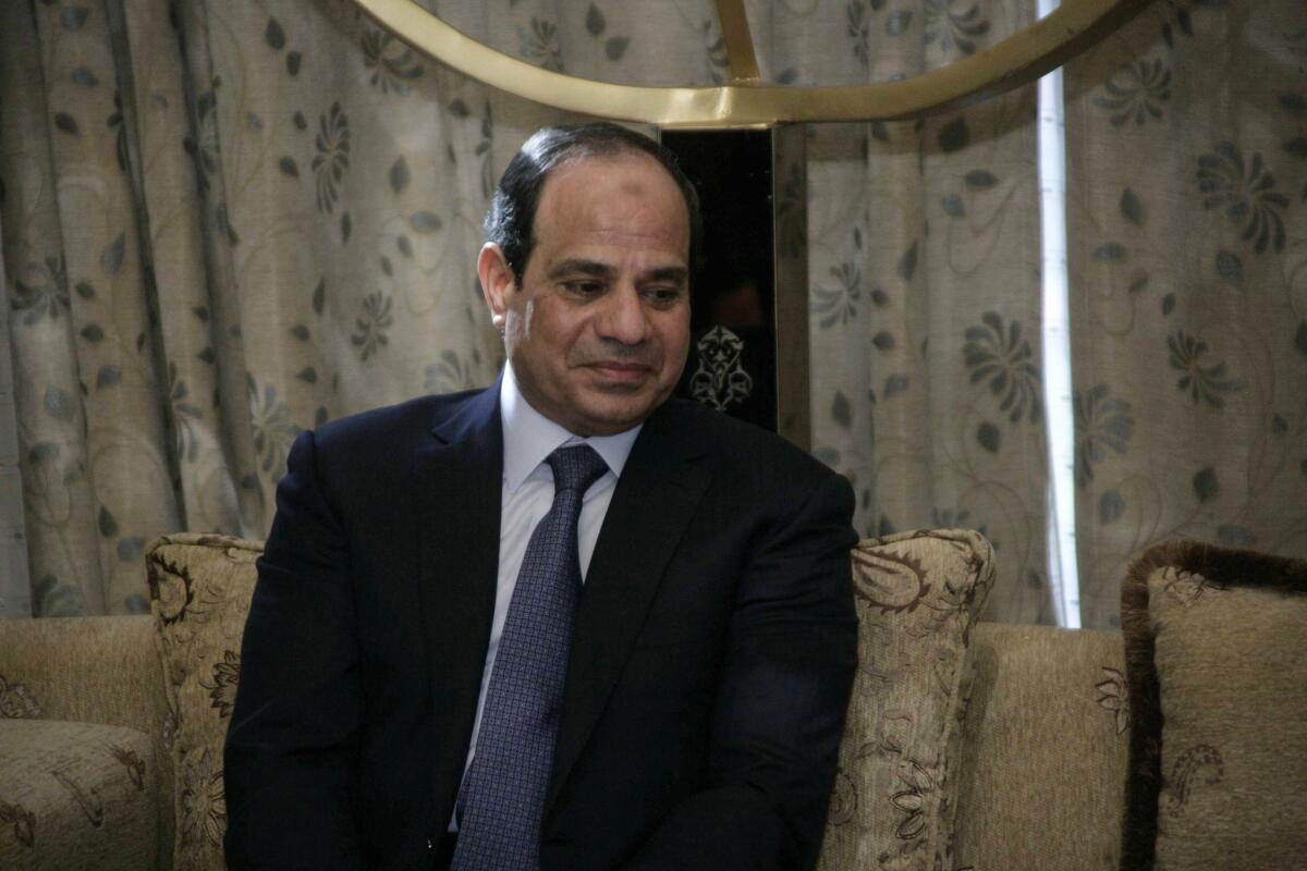 Egyptian President Abdel Fattah Sisi meets with the Sudanese president in Khartoum on June 27.