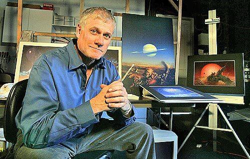 STATE OF THE ARTIST: Don Dixon, shown with some of his illustrations in his Long Beach garage, calls about 70% of his paintings dated concepts, though he still displays them on his website.