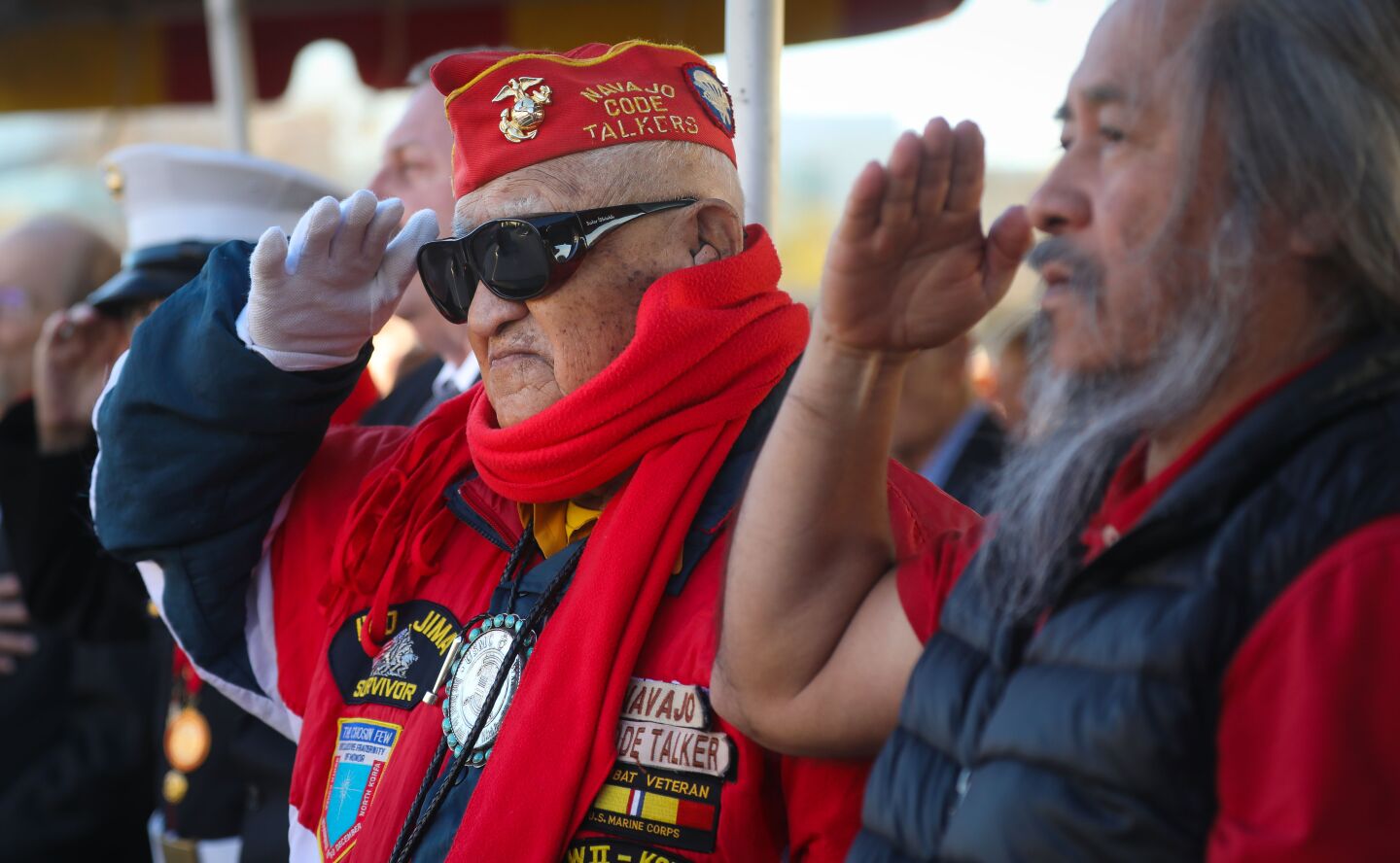 World War II Marine Corps veteran of the Battle of Iwo Jima, and one of the last Navajo code talkers, Thomas H. Begay, of Window Rock, Arizona, salutes during the national anthem, during commemoration ceremony for the 75th anniversary of the famous battle, held at Camp Pendleton, February 15, 2020. This is the last time the Iwo Jima Commemorative Committee is planning to hold a formal West Coast gathering of veterans of the battle.