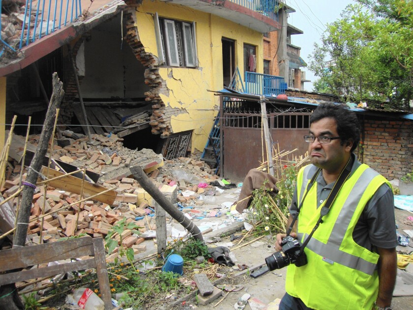 Cal State Fullerton geotechnical engineer Binod Tiwari looks grim as he surveys the damage around the Katmandu Valley after Nepal's April 25 quake.