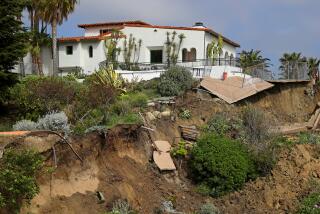 SAN CLEMENTE, CA - APRIL 28: A landslide damaged the historic Casa Romantica Cultural Center and Gardens and sent dirt and debris cascading down a hillside toward coastal railroad trackson Friday, April 28, 2023 in San Clemente, CA. Rail service remained unavailable in southern Orange County today due to a landslide that damaged the historic Casa Romantica Cultural Center and Gardens and sent dirt and debris cascading down a hillside toward coastal railroad tracks. (Gary Coronado / Los Angeles Times)