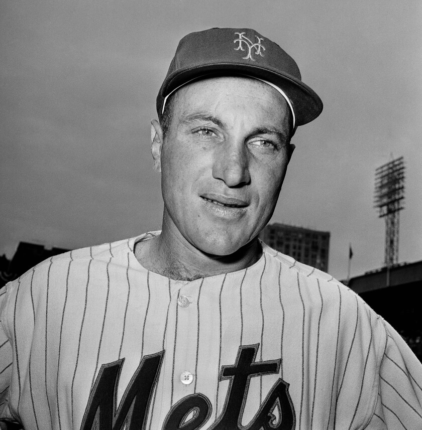 Black and white photo of man in Mets uniform 