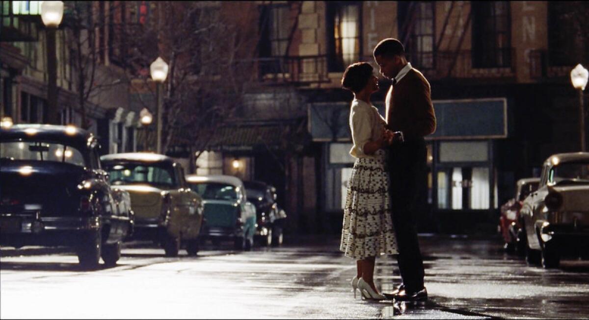 Tessa Thompson and Nnamdi Asomugha dance in a scene from "Sylvie's Love."