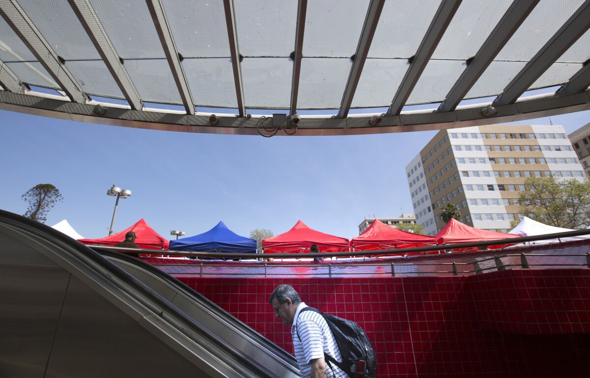 The tops of new pop-up tents for vendors at the Westlake/MacArthur Park Metro Line station.