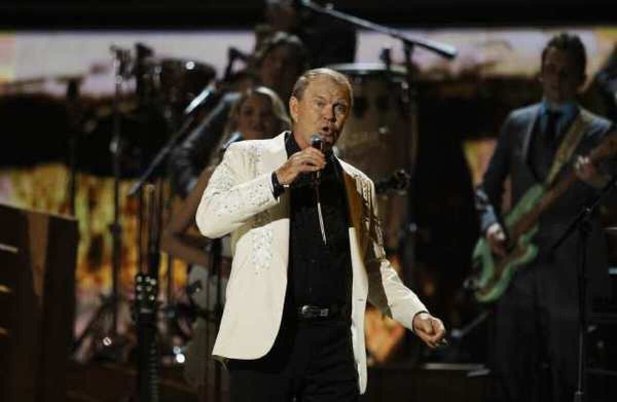 Glen Campbell, shown during his performance at the Grammy Awards, has canceled shows in Australia and New Zealand, citing health reasons.