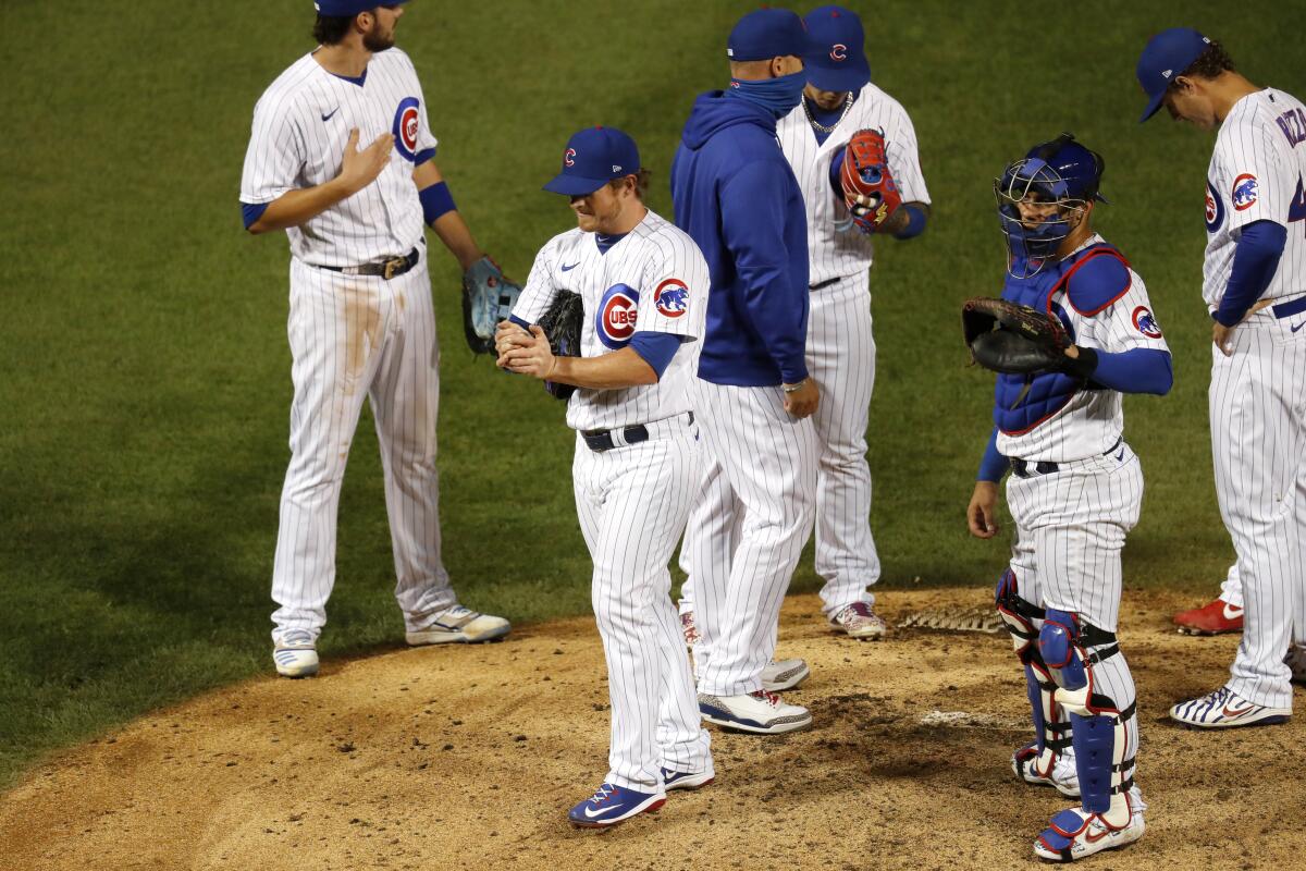 Ross pitches perfect ninth, homers for Cubs