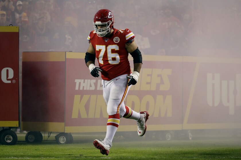 Chiefs offensive lineman Laurent Duvernay-Tardif runs onto the field before a game against the Packers on Oct. 27, 2019. 